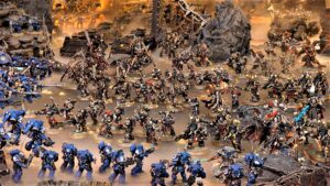 Un'epica battaglia tra Ultramarine e Black Legion infuria su un campo di battaglia desolato. Gli Ultramarine, leali difensori dell'Imperium, combattono con tenacia contro i guerrieri corrotti della Black Legion, guidati dal temibile Abaddon il Distruttore. Il destino dell'Imperium dipende dall'esito di questa sanguinosa battaglia.